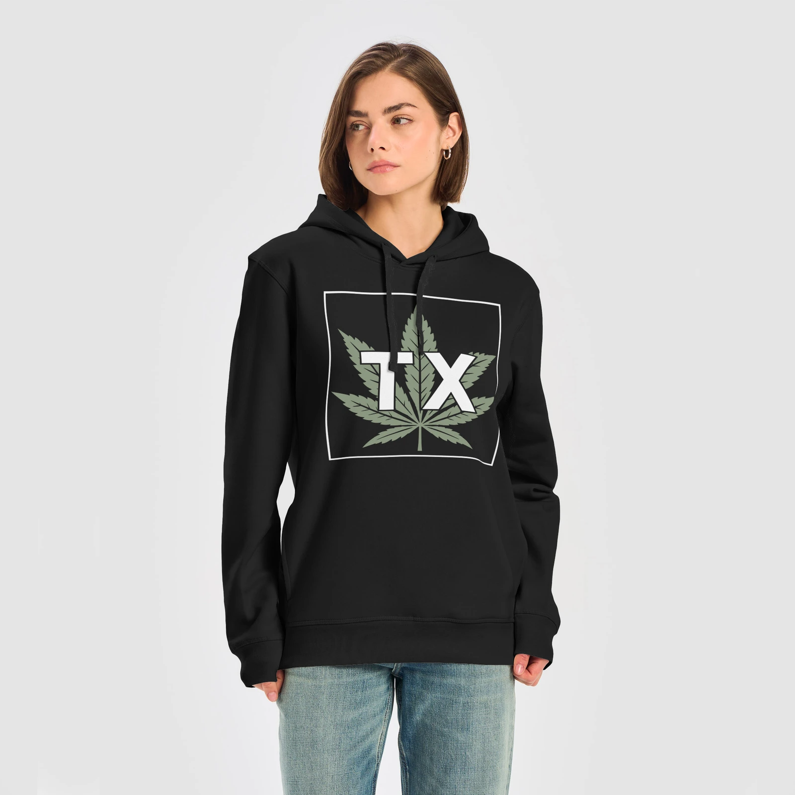 The Texas Cannabis Ledger hoodie, with its sage leaf and white TX mark